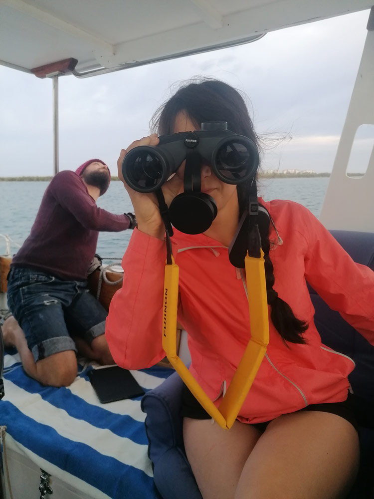 Sailor girl having Binocular fun